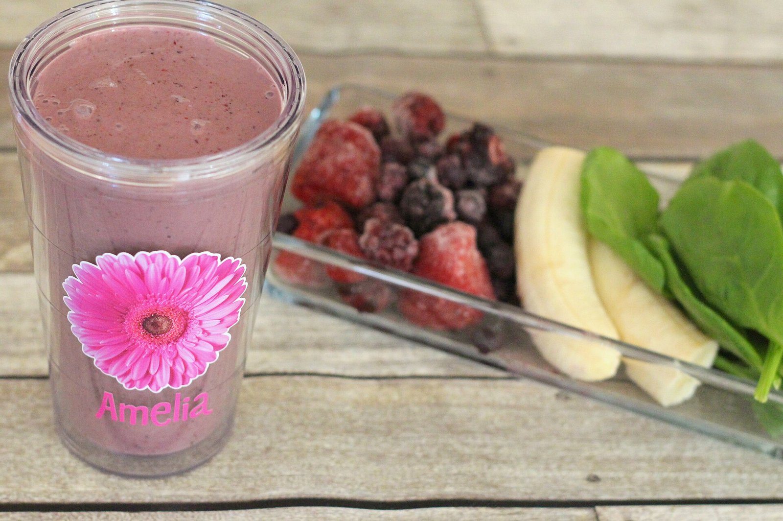 Green smoothie made with spinach and Greek yogurt in a glass