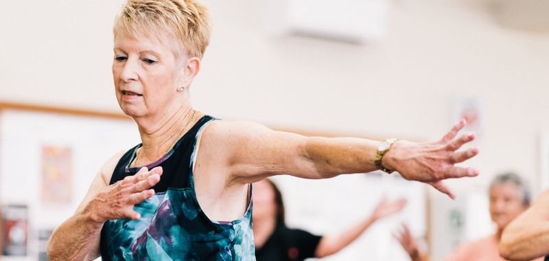 Elderly woman dancing joyfully