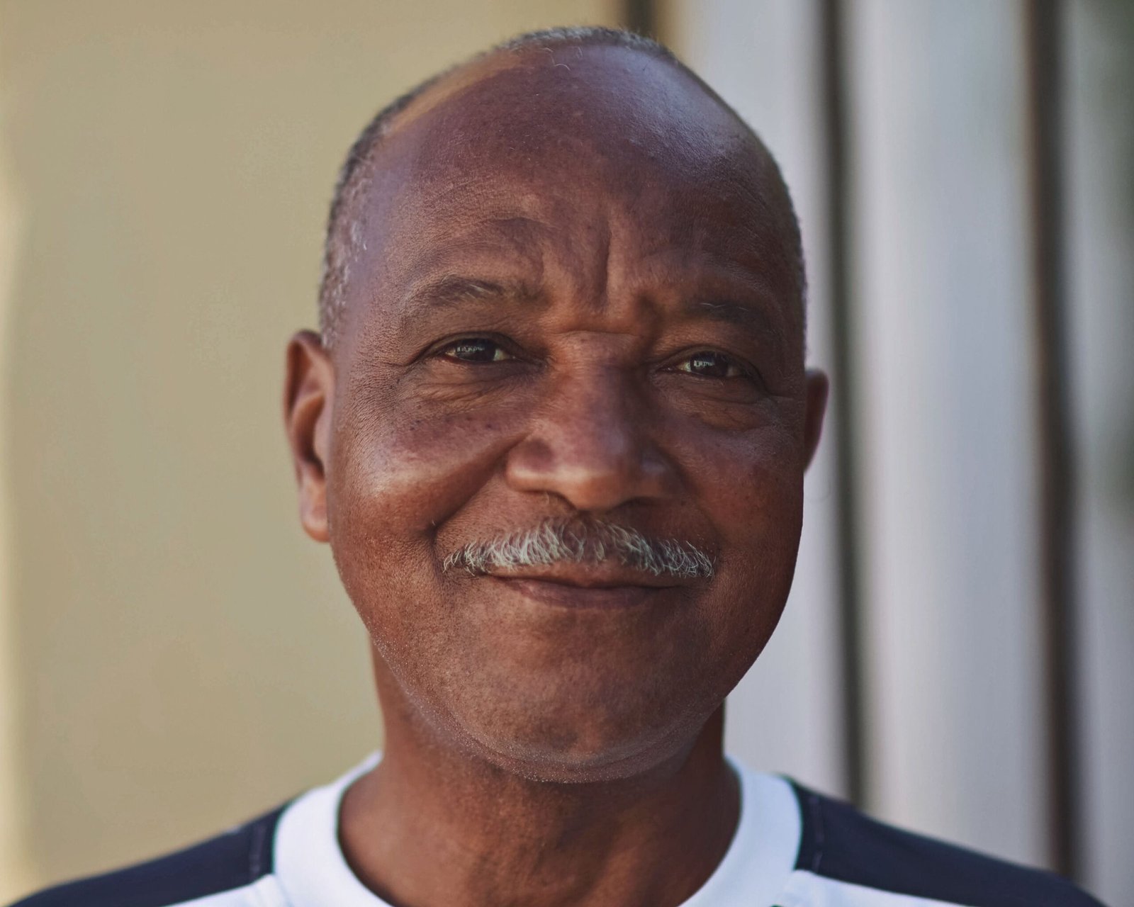 Portrait of an elderly African man with a thoughtful expression