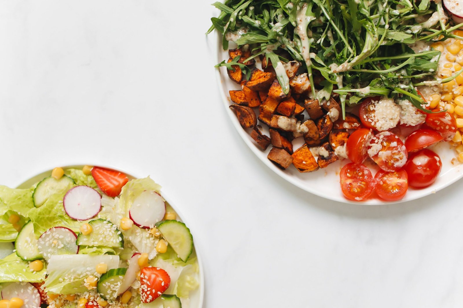 Close-up of plates with healthy, colorful food